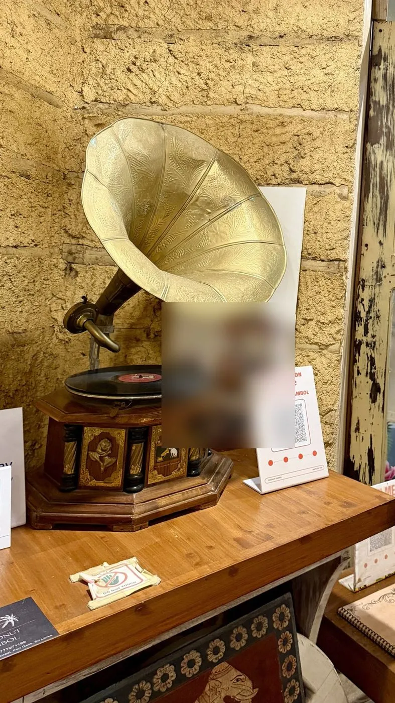 Old His Master's Voice gramophone by the counter