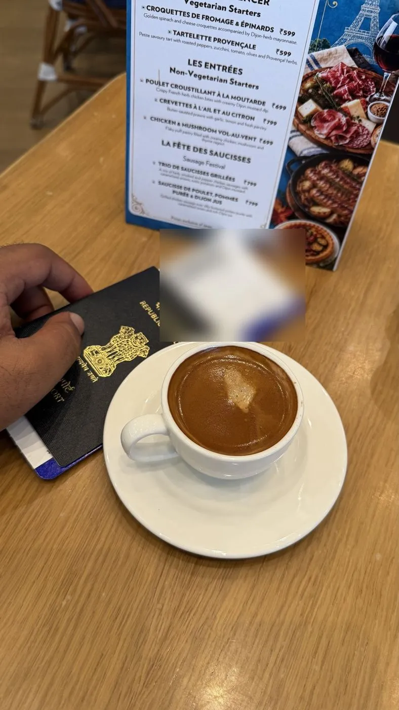 Coffee before 6E1167 to Colombo, passport and boarding pass in hand