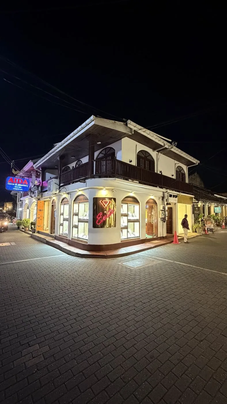 Lit-up corner of gem shops on the fort's cobbled lanes