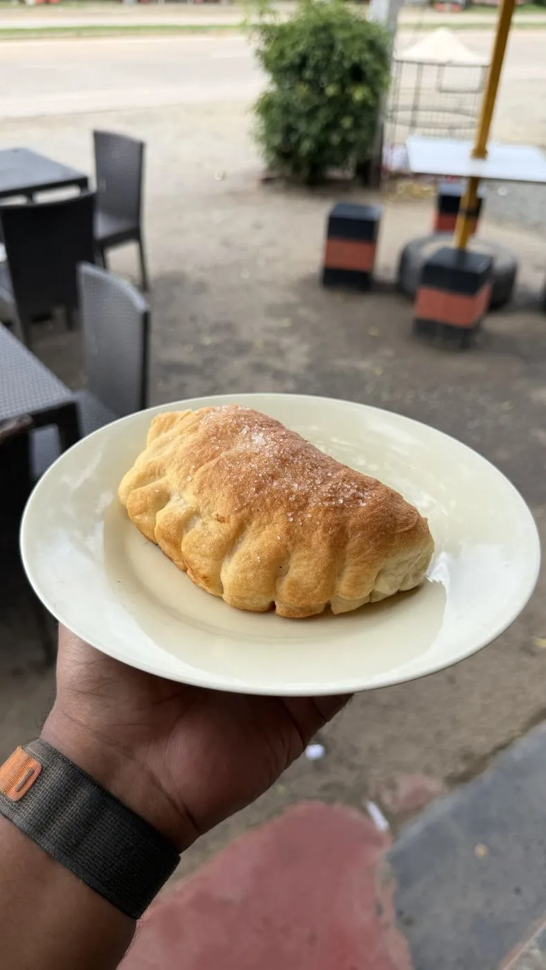 Sugar-crusted jam bun at a roadside café on the drive down, LKR 100