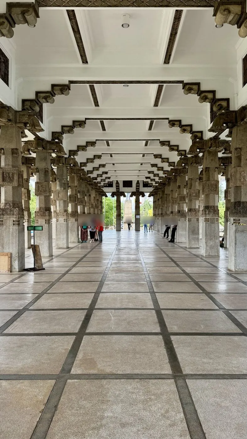 The carved stone colonnade of the Independence Memorial Hall