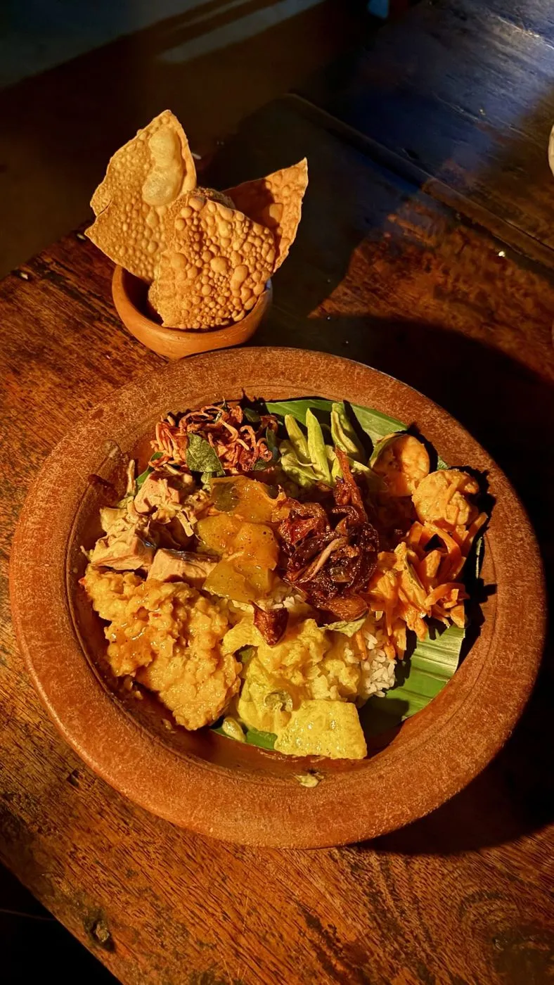 My rice & curry plate on a banana leaf, with papadums