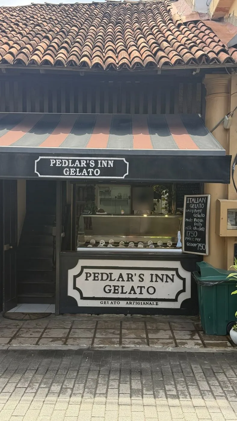 Pedlar's Inn Gelato under its striped awning on Pedlar's Street