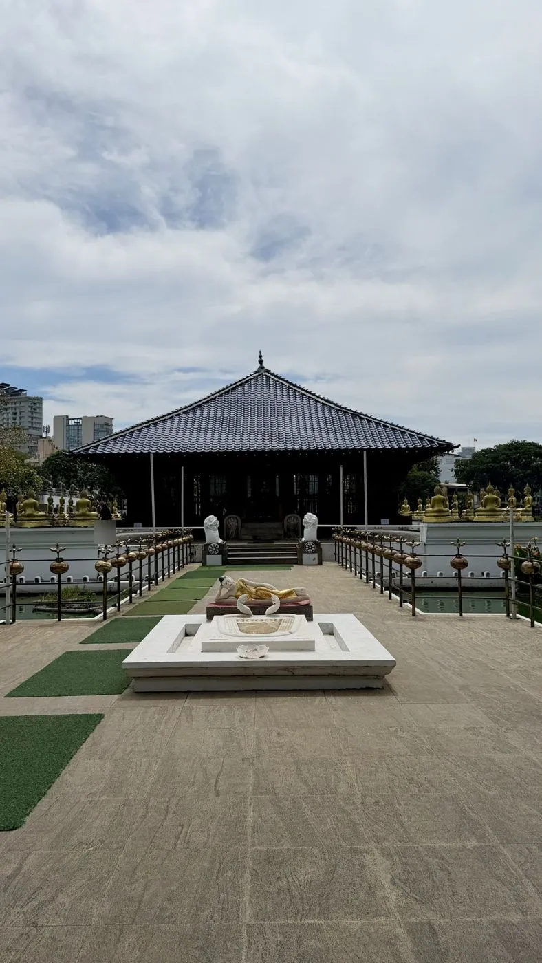 Seema Malaka on Beira Lake, ringed by golden Buddhas