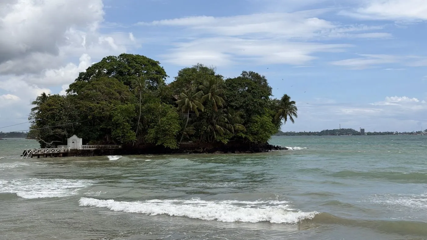 Taprobane Island in Weligama bay, with its white gate and jetty