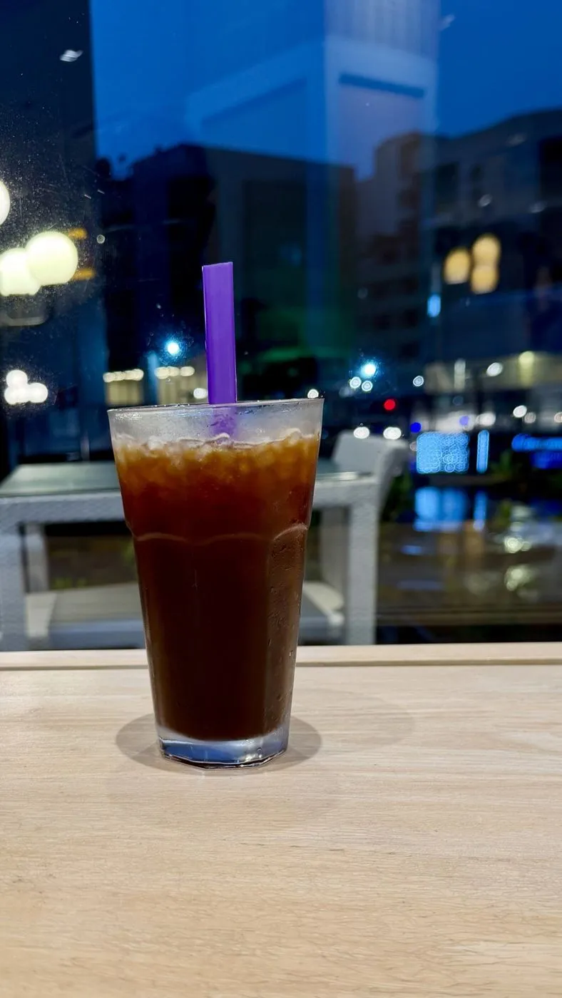 Iced coffee as Colombo's lights come on