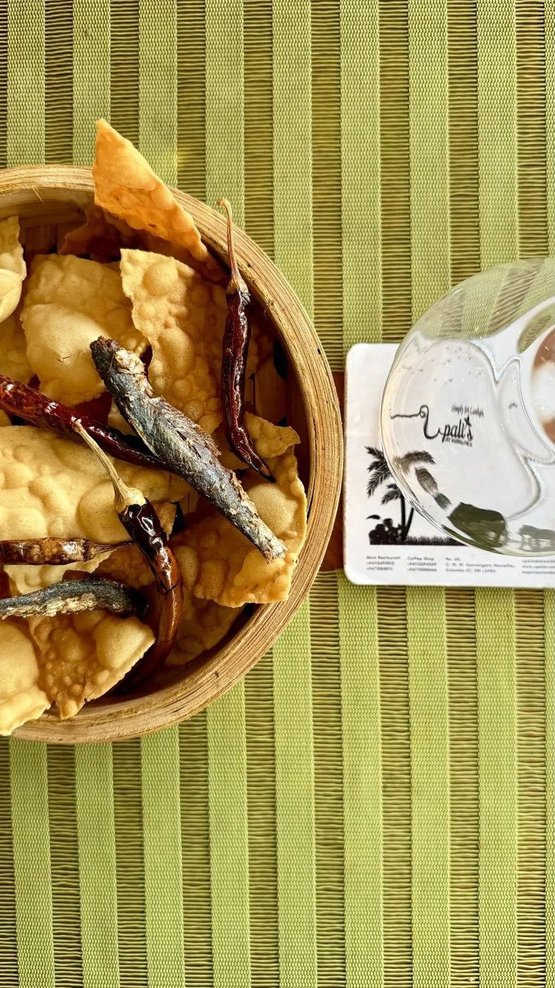 Papadam with fried chillies and dry fish