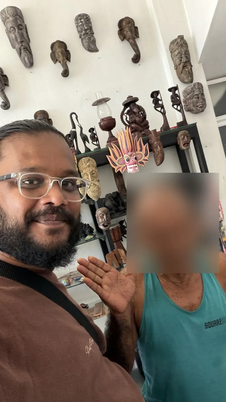 With the owner among his carvings